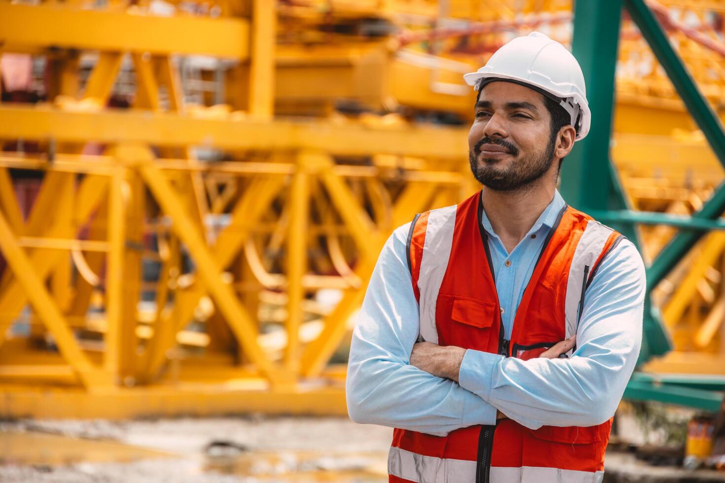 Construction leader overseeing work in the field